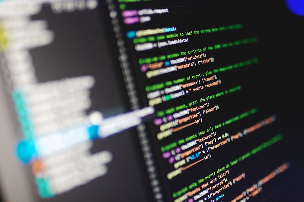 Close-up of a computer screen displaying colorful programming code in JavaScript.